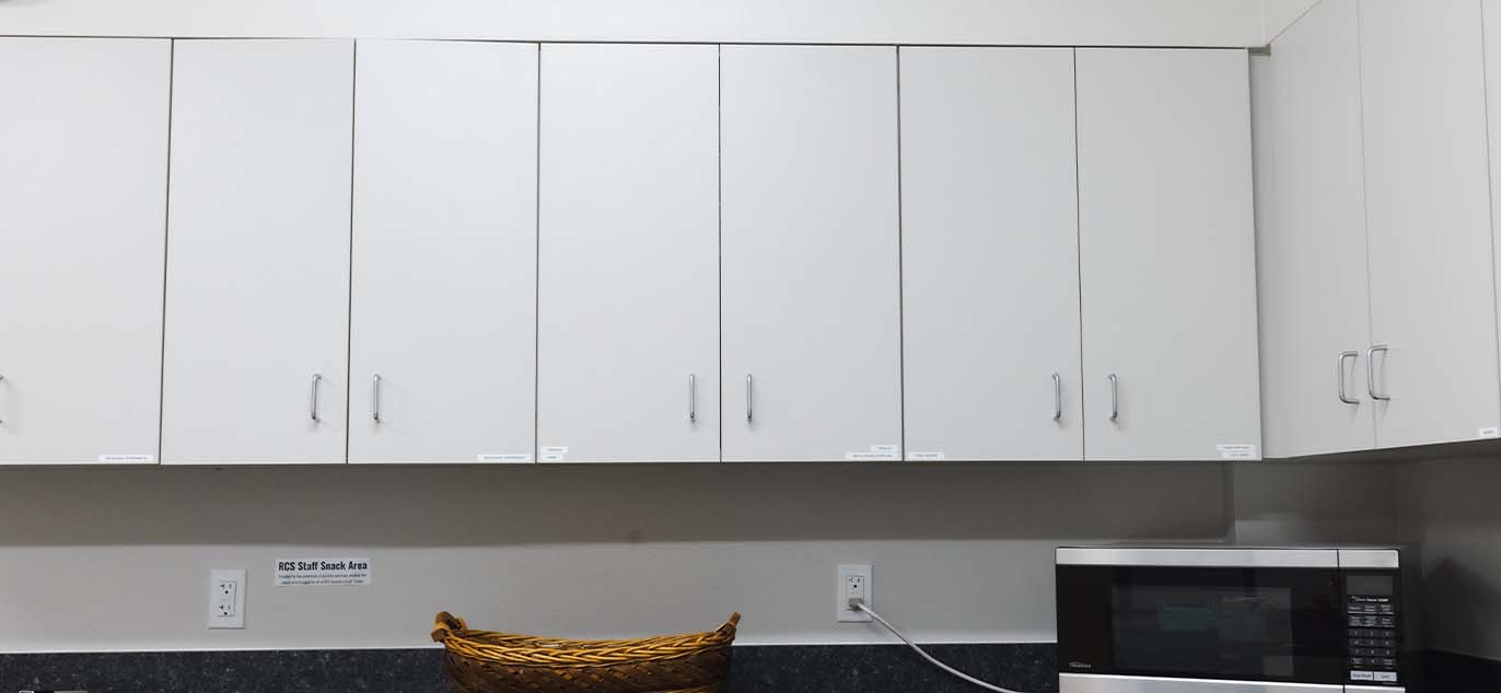 Close-up of white cabinets