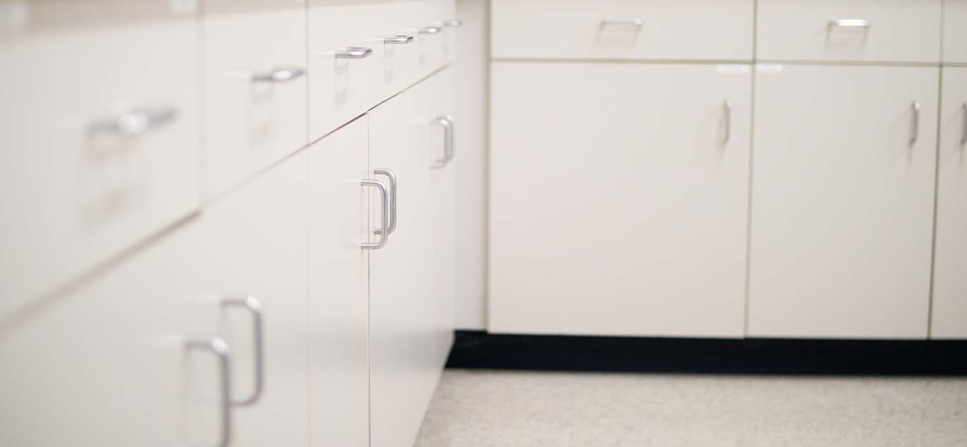 Close-up of white cabinets