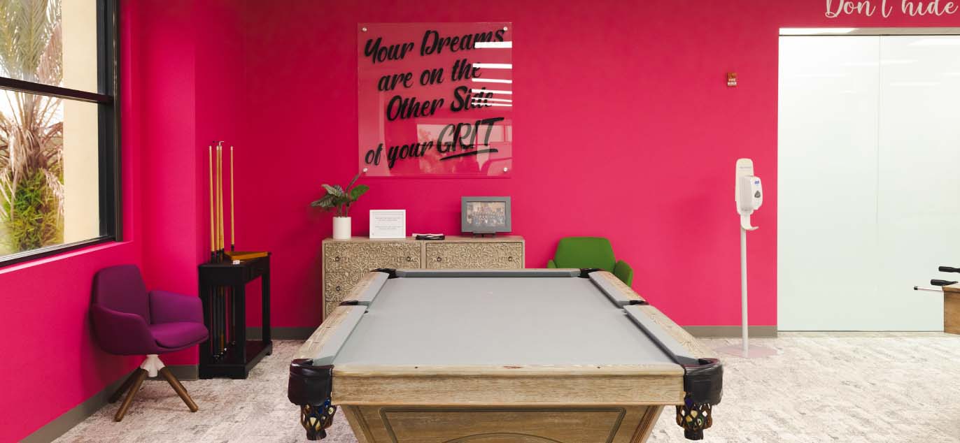 Pink walls and pool table