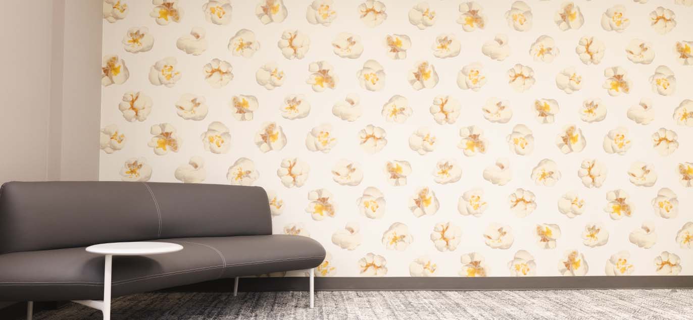 Popcorn wallpaper and brown couch